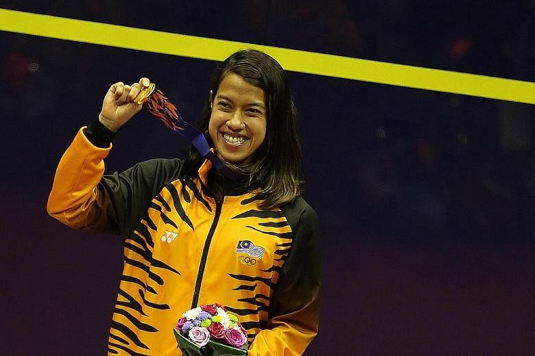 Malaysian Nicol David holding her gold medal at the 2014 Asian Games in Incheon. She ended her squash career in 2019 as a seven-gold Asian Games champion.