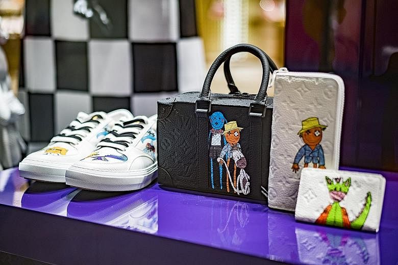 The installation of luxury shipping containers outside Ion Orchard emblazoned with Louis Vuitton's logo is part of the fashion house's Men's Spring Summer 2021 Collection.