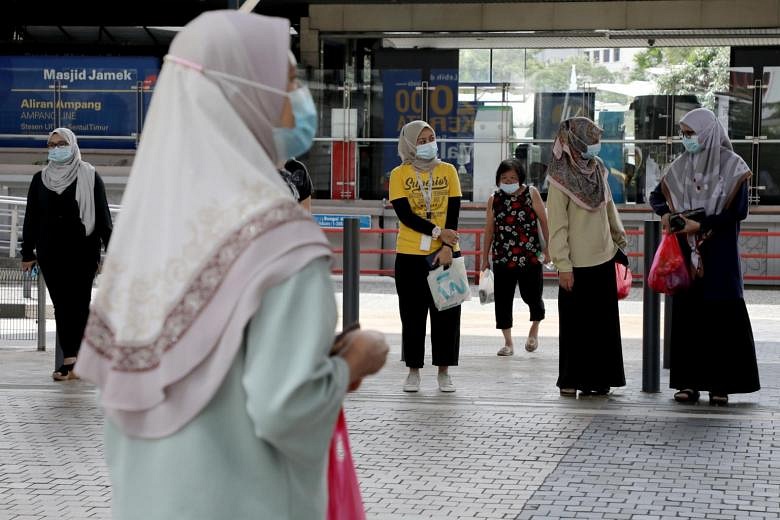 Anti-vaxxers turn vaccine advocates in Malaysia after brush with 