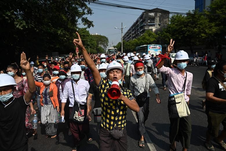 A demonstration against Myanmar's military coup in Yangon yesterday. Anti-coup activists who have been coordinating a nationwide civil disobedience movement said they had anticipated the Internet shutdown.