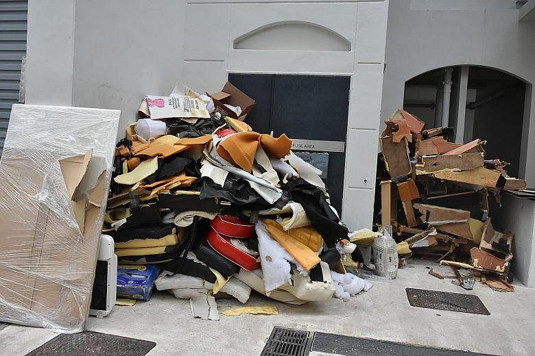 Clockwise from above, left: Bulky items dumped at a non-designated area below a Boon Tiong Road HDB flat in Tiong Bahru on Feb 1; non-recyclable items left next to a recycling bin in Tiong Bahru; and furniture discarded at a bin centre in Lorong 6 To