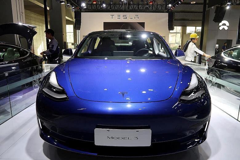 Two versions of the Tesla Model 3 have appeared on the Land Transport Authority's fuel economy comparison site, which means the US electric car manufacturer is almost ready to reopen for business here.