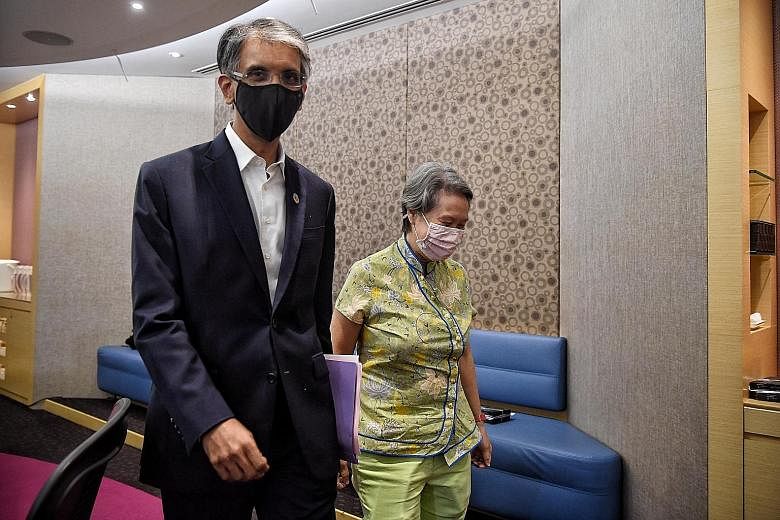 Ms Ho Ching and Mr Dilhan Pillay Sandrasegara leaving after the press conference yesterday announcing his succession as executive director and CEO of Temasek Holdings.