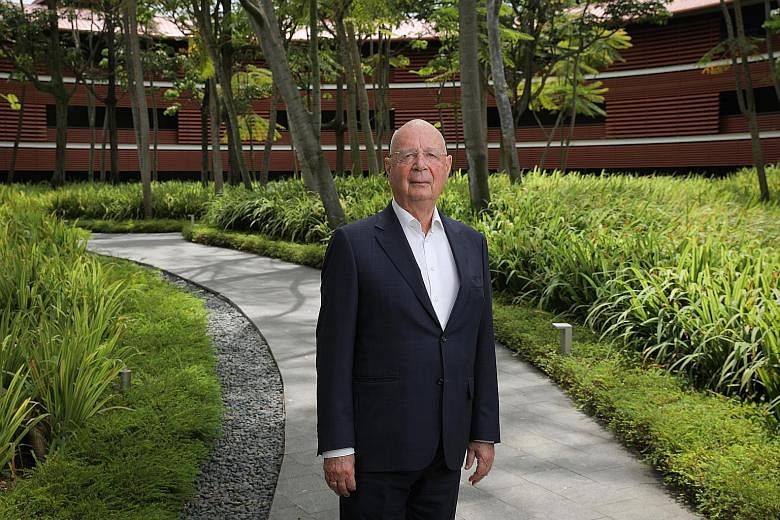 World Economic Forum founder and executive chairman Klaus Schwab in Singapore on Tuesday. In his book, he says the Republic takes decisive action to ensure its population benefits from quality access to education, healthcare and housing, but steers c