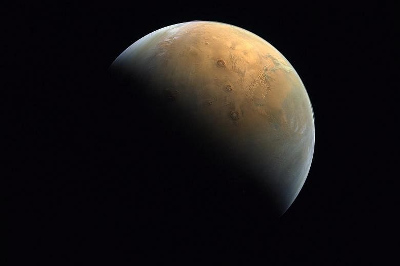 An image of Mars taken 24,700km above the planet's surface by the United Arab Emirates' "Hope" probe after entering its orbit last week.