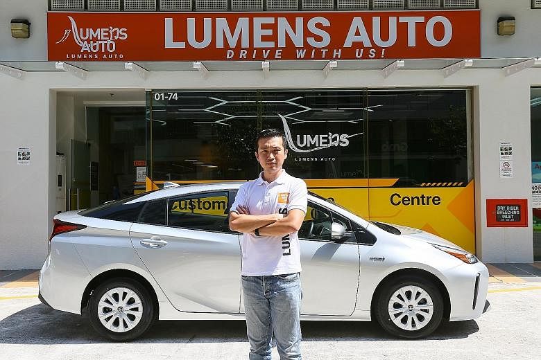 Mr Chiam Soon Chian, chief operating officer of Lumens Auto, said the Jobs Support Scheme made it possible for the vehicle leasing firm to keep all its staff last year, as well as hire more staff for new business initiatives. PHOTO: LIANHE ZAOBAO