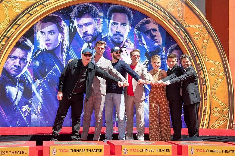 (From far left) President of Marvel Studios Kevin Feige and stars of the Avengers films - actors Chris Hemsworth, Chris Evans, Robert Downey Jr, Scarlett Johansson, Jeremy Renner and Mark Ruffalo - at the TCL Chinese Theatre in Hollywood, California,