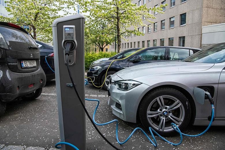 Cars charging in Norway. The European Union is subsidising battery production to avoid dependence on Asian suppliers.