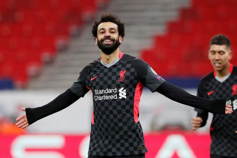 Forward Mohamed Salah celebrating after scoring the opener in Liverpool's 2-0 Champions League last-16, first-leg victory over Leipzig on Tuesday that ended a three-game losing streak.