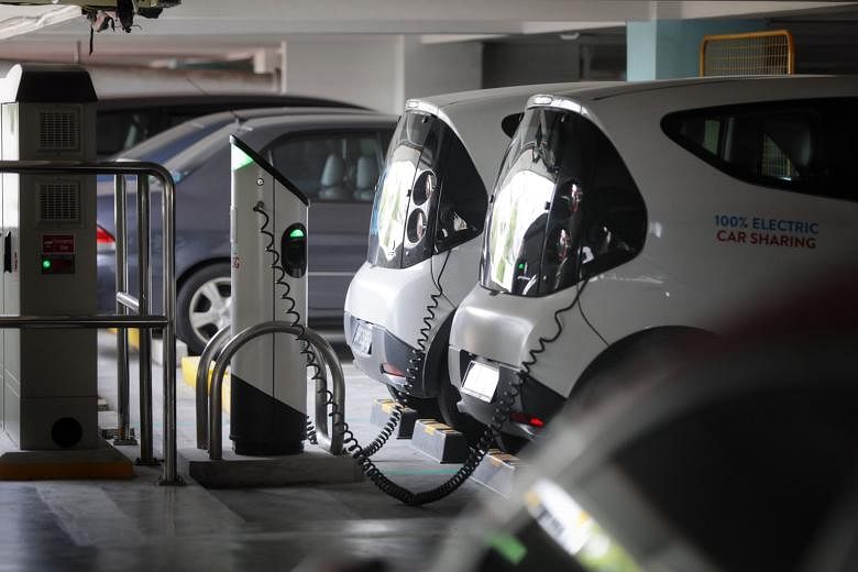 The writer says that Singapore has to make sure there are enough electric car charging points, and that they are not all at some remote location.