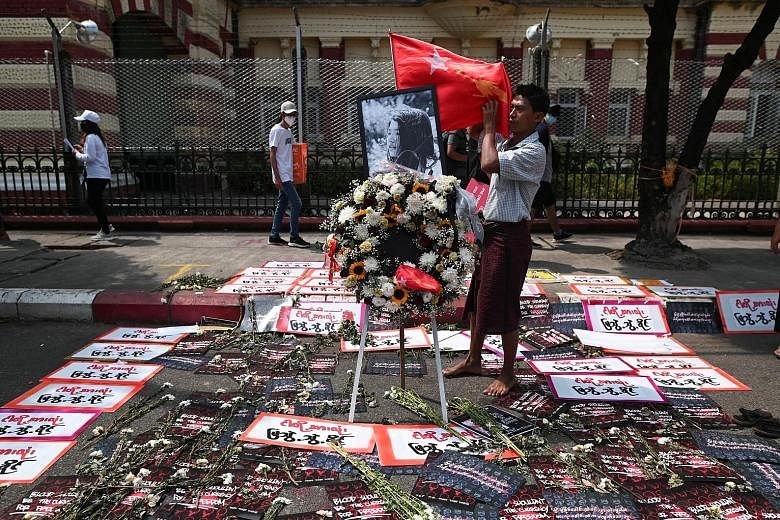 A memorial in Yangon for Ms Mya Thwate Thwate Khaing, 20, who died yesterday. She had been on life support since being taken to hospital on Feb 9, after she was hit by what doctors said was a live bullet at a protest in the capital, Naypyitaw. PHOTO: