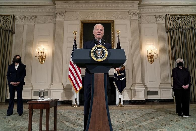 The image conveyed by Washington is one of calm, with President Joe Biden himself sporting a reassuringly sober look while his officials appear to go about their business with a quiet, effortless competence, says the writer.
