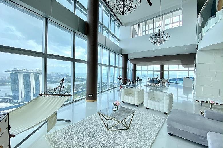 Five penthouses at Marina Bay Residences, including an 11,012 sq ft triplex penthouse (above, right), were recently put up for collective sale at an indicative price of $138 million, which works out to about $4,884 per sq ft.