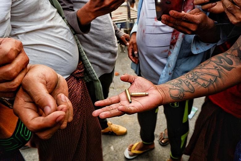 Cartridges of both live rounds and rubber bullets were found by witnesses after the authorities opened fire on the protesters in Mandalay. Tensions mounted in Mandalay yesterday when police and soldiers confronted shipyard workers and other protester