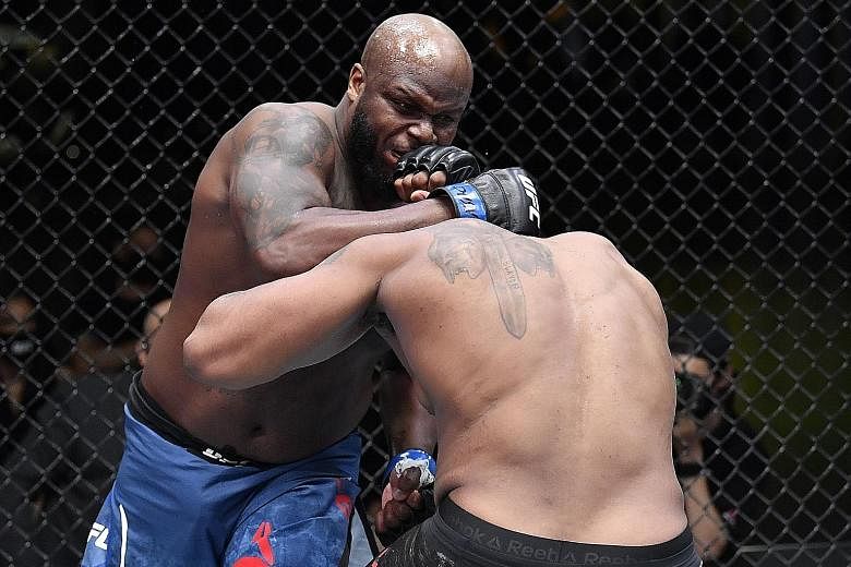 Derrick Lewis choking Curtis Blaydes in their UFC Fight Night heavyweight bout in Las Vegas on Saturday on the way to his fourth straight win. PHOTO: UFC