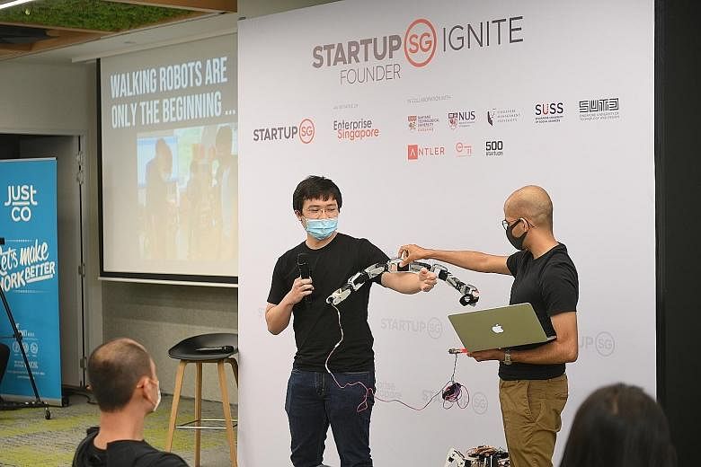 Mr Jeremy Koh (left) pitching his winning idea at Founder Ignite yesterday. He and his partner Aditya Kapoor run Whyte Labs, which teaches children about building robots with mathematics and science knowledge gained from school.