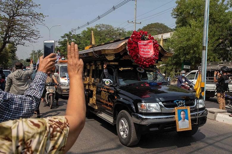 Protesters at the funeral of Mr Thet Naing Win, who was shot last week while taking part in a rally, in Mandalay yesterday. The G-7 nations - comprising Canada, France, Germany, Italy, Japan, Britain and the US - as well as the EU's High Representati