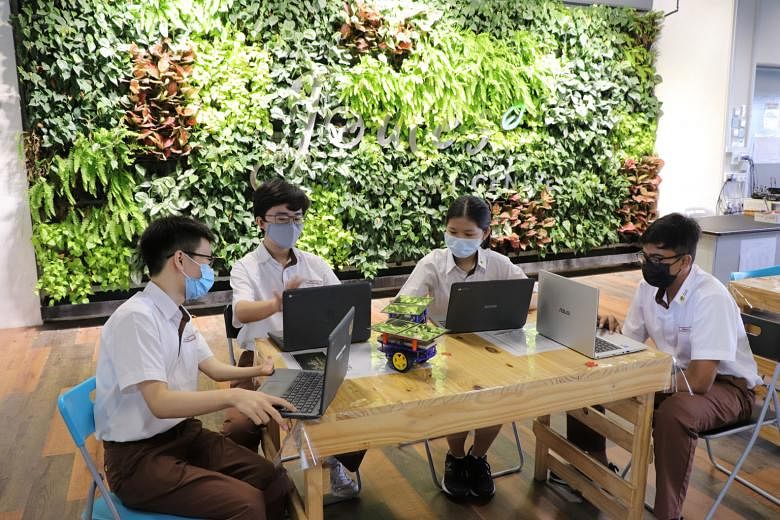 Bukit View Secondary School students using their personal learning devices. Education Minister Lawrence Wong says the security software built into learning devices does not track details such as passwords and locations. PHOTO: COURTESY OF BUKIT VIEW 