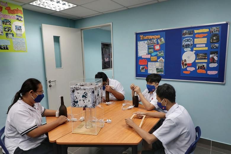 Students at The Galaxy at BMSS, an after-school activity centre at Bukit Merah Secondary School. President Halimah Yacob said at the official launch yesterday that the centre provides students with a safe environment where they can have the support o