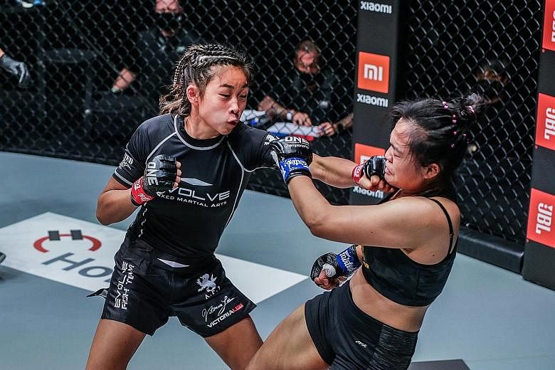 Victoria Lee, 16, younger sister of world champion Angela, landing a punch against Sunisa Srisen. Victoria would eventually choke out her Thai opponent to win by submission on her One Championship debut last night.