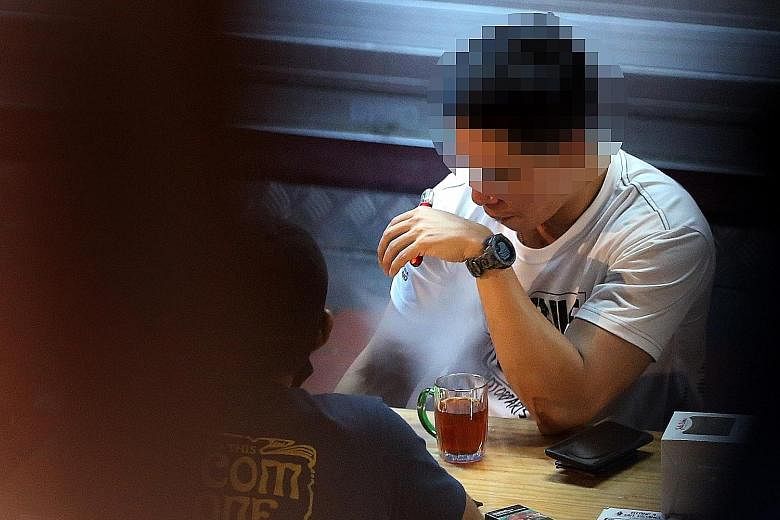 Some students tell of friends who experimented with vaping and got hooked. A psychotherapist said he has seen more teenagers here addicted to vaping since 2018, with most aged from 15 to 17. A patron at a late-night eatery in town inhales an e-vapori