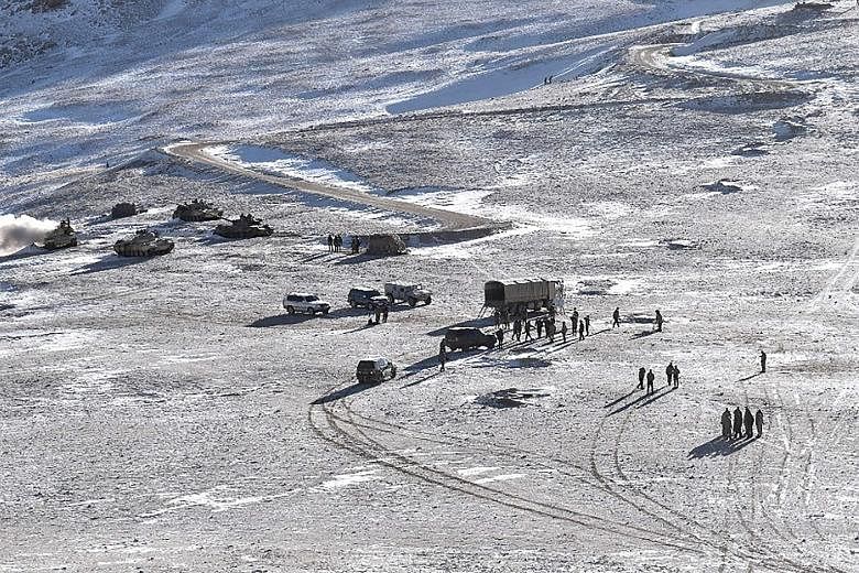 This undated handout picture, released by the Indian Army on Feb 16, shows Chinese soldiers and tanks during military disengagement along the Line of Actual Control (LAC) in Ladakh. The LAC is a notional demarcation line separating Indian-controlled 