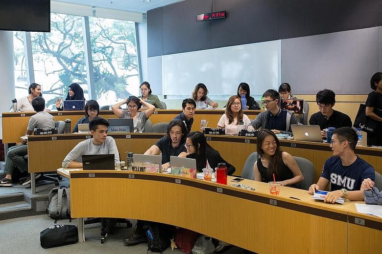 (Above) SMU students on a community-involvement project in Nepal in 2019. (Left) Seminar-style teaching at Singapore Management University.