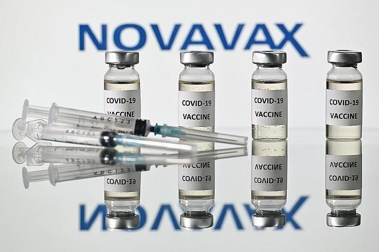 Novavax CEO Stanley Erck says the company will be able to have tens of millions of doses of the vaccine stockpiled and ready to ship in the US when it receives authorisation. PHOTOS: AGENCE FRANCE-PRESSE, REUTERS
