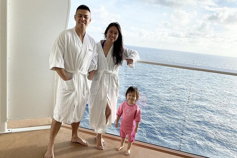 Operations manager Serene Tan, 36, her husband, Mr Jingwei Chia, 38, and their daughter Avery, three, on board the Quantum of the Seas during a cruise from Dec 28 to 30. A passenger at the balcony of her room on Royal Caribbean International's Quantu