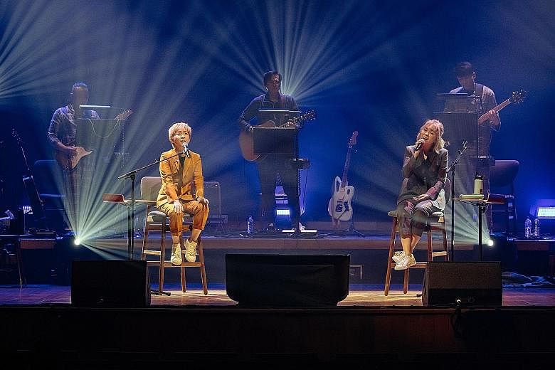 Home-grown pop duo The Freshman, consisting of Chen Diya (foreground, left) and Carrie Yeo (foreground, right), performing at the Esplanade Concert Hall on Feb 20.