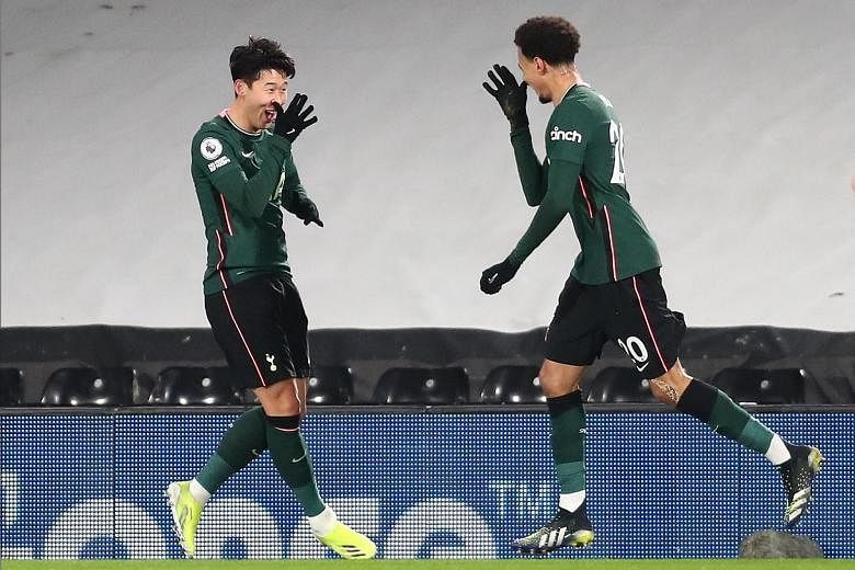 Tottenham's Son Heung-min and Dele Alli are delighted after the latter's effort is deflected off Fulham's Tosin Adarabioyo for an own goal. Spurs won 1-0.