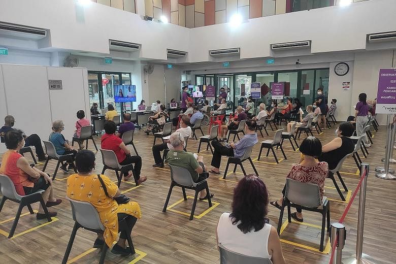 People waiting in the observation area after getting their Covid-19 jab at the vaccination centre at Teck Ghee Community Club, at around 4pm last Wednesday. This is where they are monitored after vaccinations. More than 40,000 seniors aged 70 and abo