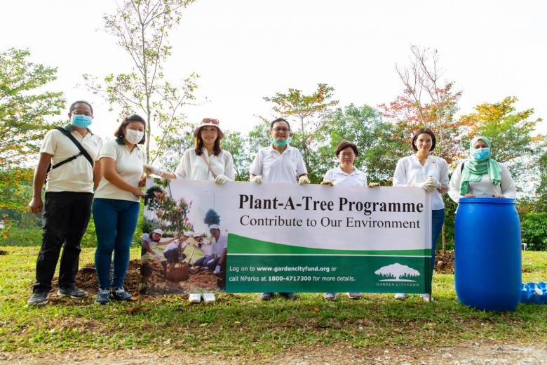 Hospital plants 50 trees in support of NParks' 1 million tree goal