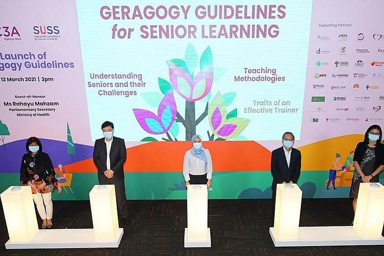 Parliamentary Secretary for Health Rahayu Mahzam (centre) at yesterday's launch of the geragogy guidelines developed by the Council for Third Age (C3A) and Singapore University of Social Sciences (SUSS), along with (from left) C3A chief executive Soh