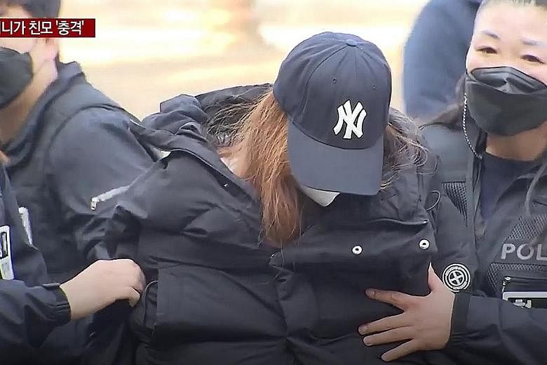 A 49-year-old woman being escorted to Daegu District Court last Thursday for investigations in relation to the death of a three-year-old girl in Gumi city. She was earlier believed to be the grandmother of the child, but DNA results have revealed tha
