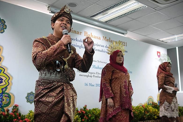 Left: Some of the teachers participating at the Malay Language Seminar. Minister of State Muhammad Faishal Ibrahim (above) said Malay language teachers have adjusted to using technology in their lessons well to enhance the joy of learning the languag