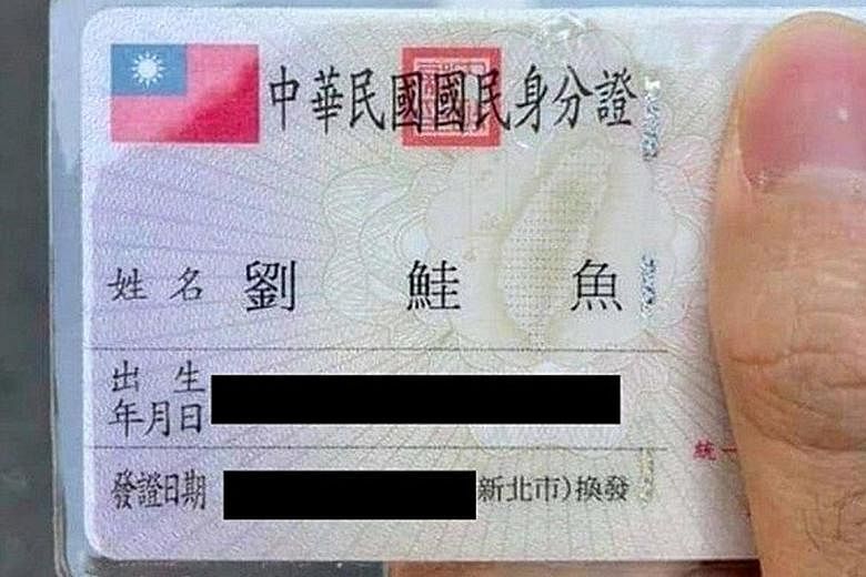 A Taiwanese ID card containing "gui yu" - the Chinese characters for salmon. Around 150 people went to government offices in Taiwan to change their names to take advantage of a restaurant promotion that entitles anyone whose ID card has "gui yu" to a