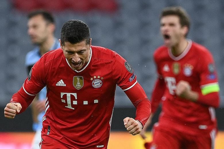 Polish forward Robert Lewandowski is elated after putting Bayern in the lead from the spot against Lazio on Wednesday. The Champions League holders won 2-1 to qualify for the quarter-finals 6-2 on aggregate.