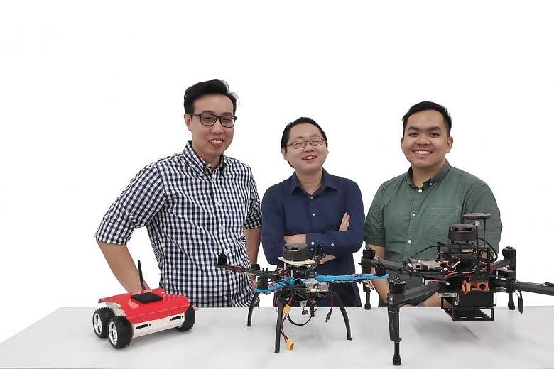 Start-up Polybee, one of eight finalists in the Lee Kuan Yew Global Business Plan Competition, developed a way of pollinating indoor-grown fruit using autonomous micro-drones like the one above. (From left): MyrLabs founder and managing director Gabr