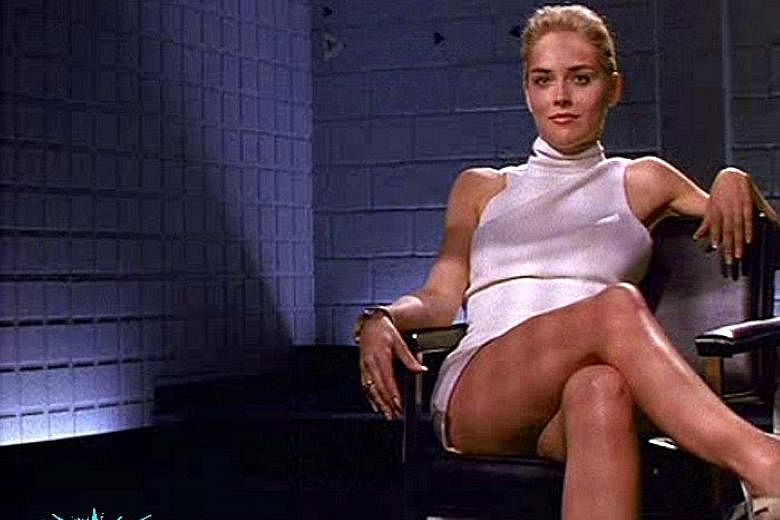 Sharon Stone in the infamous scene in Basic Instinct (1992) where she crosses and uncrosses her legs while being interrogated as a murder suspect by a roomful of men.