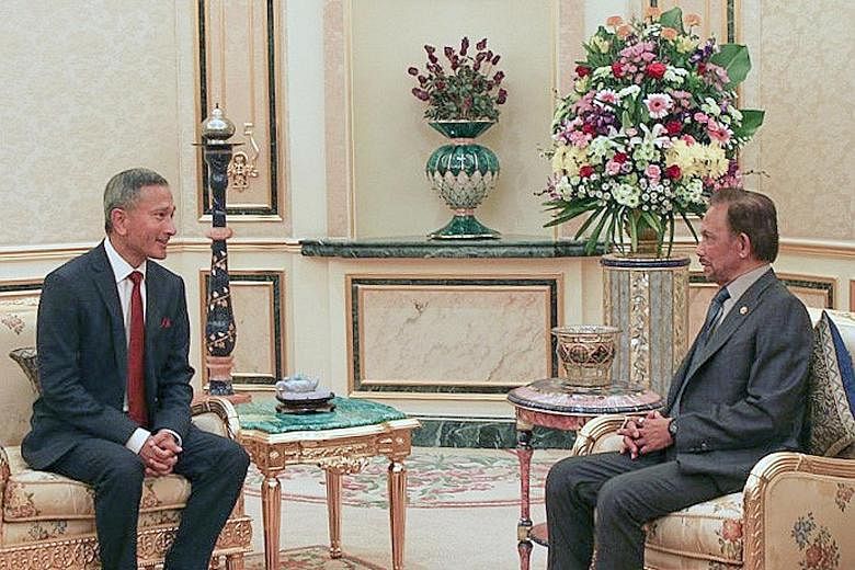 Foreign Minister Vivian Balakrishnan meeting Brunei's Sultan Hassanal Bolkiah yesterday during a trip to the country, where he reaffirmed Singapore's special relationship with Brunei. PHOTO: MINISTRY OF FOREIGN AFFAIRS