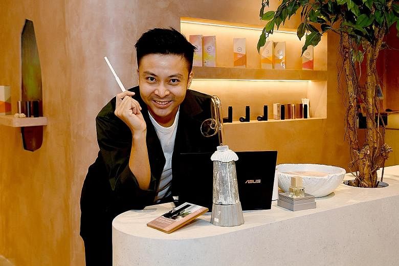 Digitalisation was not a priority for fragrance retailer Scent by Six's founder Jason Lee when he started the business in 2014. But during the two-month circuit breaker last year, he realised that it was the only way to reach customers. ST PHOTO: MOH