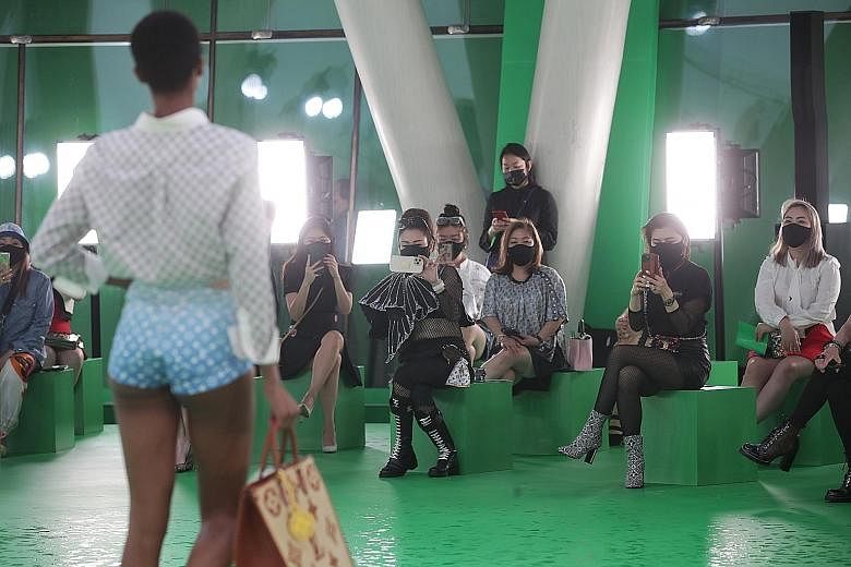 The evening session of the Louis Vuitton Women's Spring/Summer 2021 Spin-Off show yesterday at the ArtScience Museum was a "phygital" event, live-streamed to an online audience, but also with 112 guests at the venue.