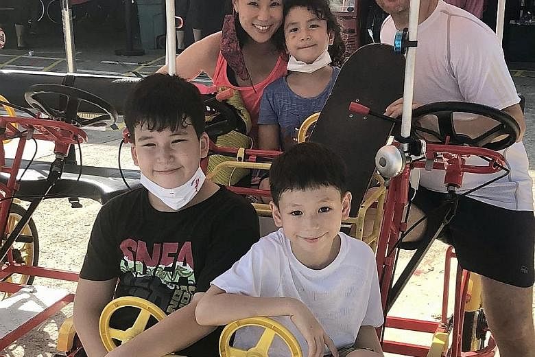 Lynn Yeow de Vito with husband Beppe de Vito and sons Lucio (at the back), Tanin (front, left) and Nico (front, right).