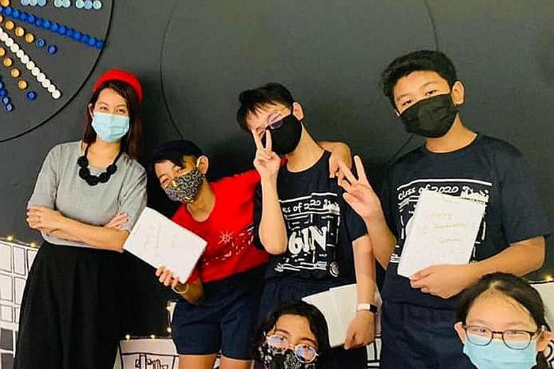 Meridian Primary School department head Han Zi Rui (far left) said she took the jab to protect her own children, as well as her pupils. PHOTO: MINISTRY OF EDUCATION/ FACEBOOK