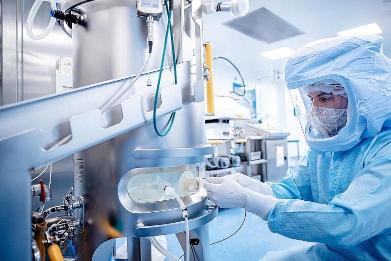 The Pfizer-BioNTech vaccine being manufactured at a facility in Marburg, Germany, in January. mRNA vaccines like this one involve injecting snippets of the virus' genetic material and not the whole virus into the body to stimulate an immune response.