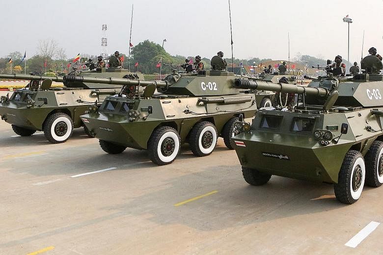 Armoured vehicles participating in the Armed Forces Day parade in Naypyitaw last Saturday. A steady diet of propaganda feeds soldiers notions of enemies at every corner, interviews revealed. The cumulative effect is a bunkered worldview in which orde