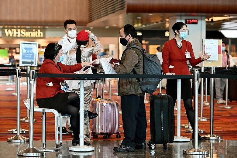 Passengers at Changi Airport Terminal 1 late last year. The Ministry of Transport said it was looking to establish new travel arrangements with countries and regions which have "successfully controlled the pandemic through surveillance and testing, c