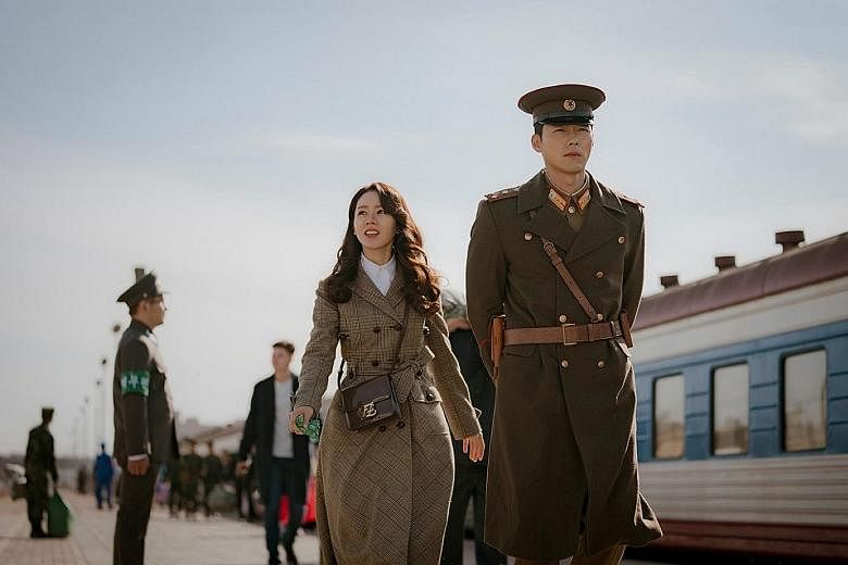 The hit K-drama, starring (above, from left) Son Ye-jin and Hyun Bin, is to be staged as a musical next year, but it is unknown if the leads will be involved.