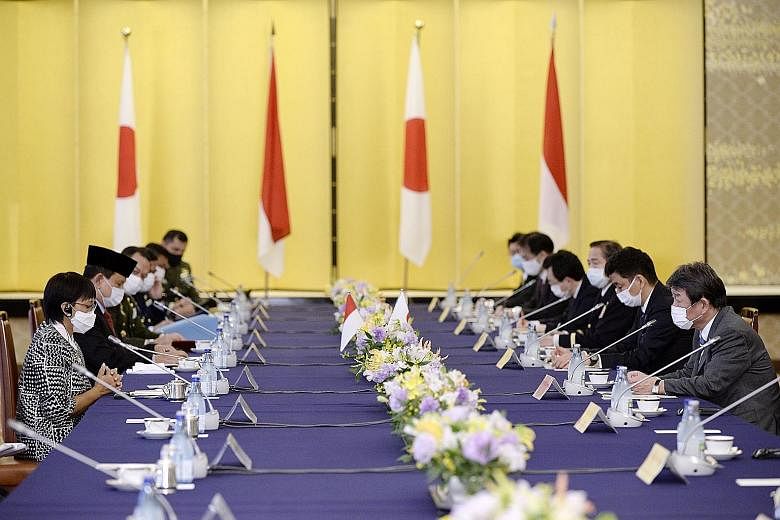 Indonesian Foreign Minister Retno Marsudi (left) and Defence Minister Prabowo Subianto (second from left) with Japanese Foreign Minister Toshimitsu Motegi (right) and Defence Minister Kishi Nobuo (second from right) at a two-plus-two meeting between 